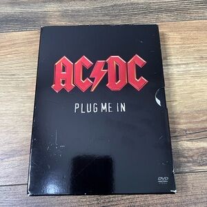 AC/DC Plug Me In DVD set approximately 5 hours 1975-1979 1981-2003‎